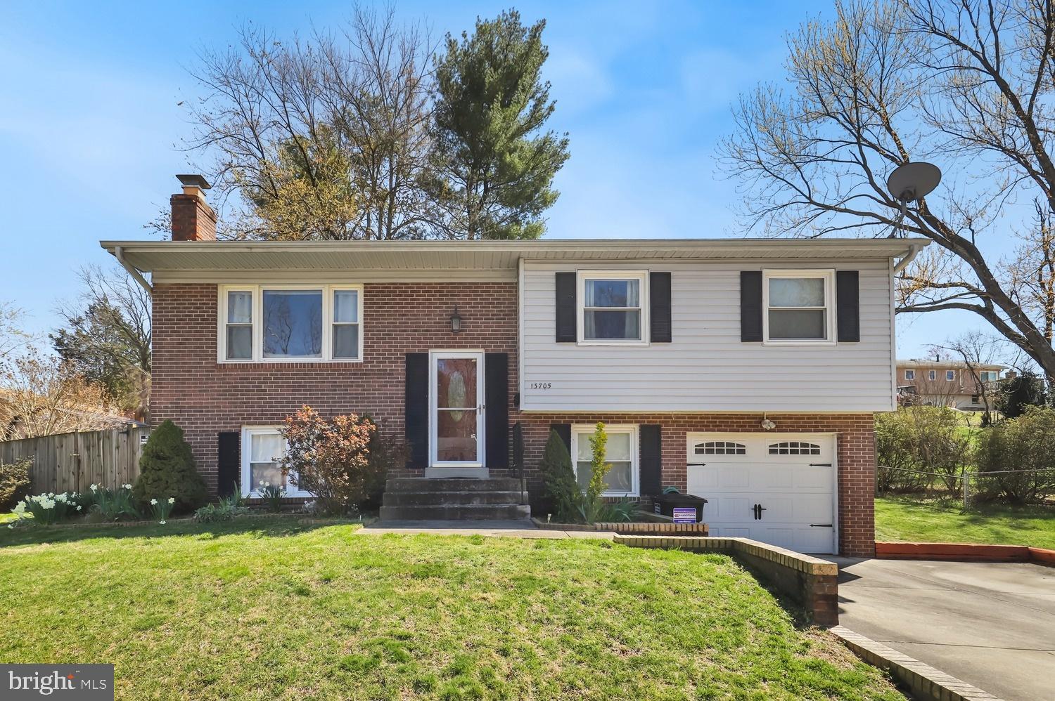 13705 Kerrydale Road Woodbridge, VA 22193 - Photo 1 of 32 a front view of a house with a yard