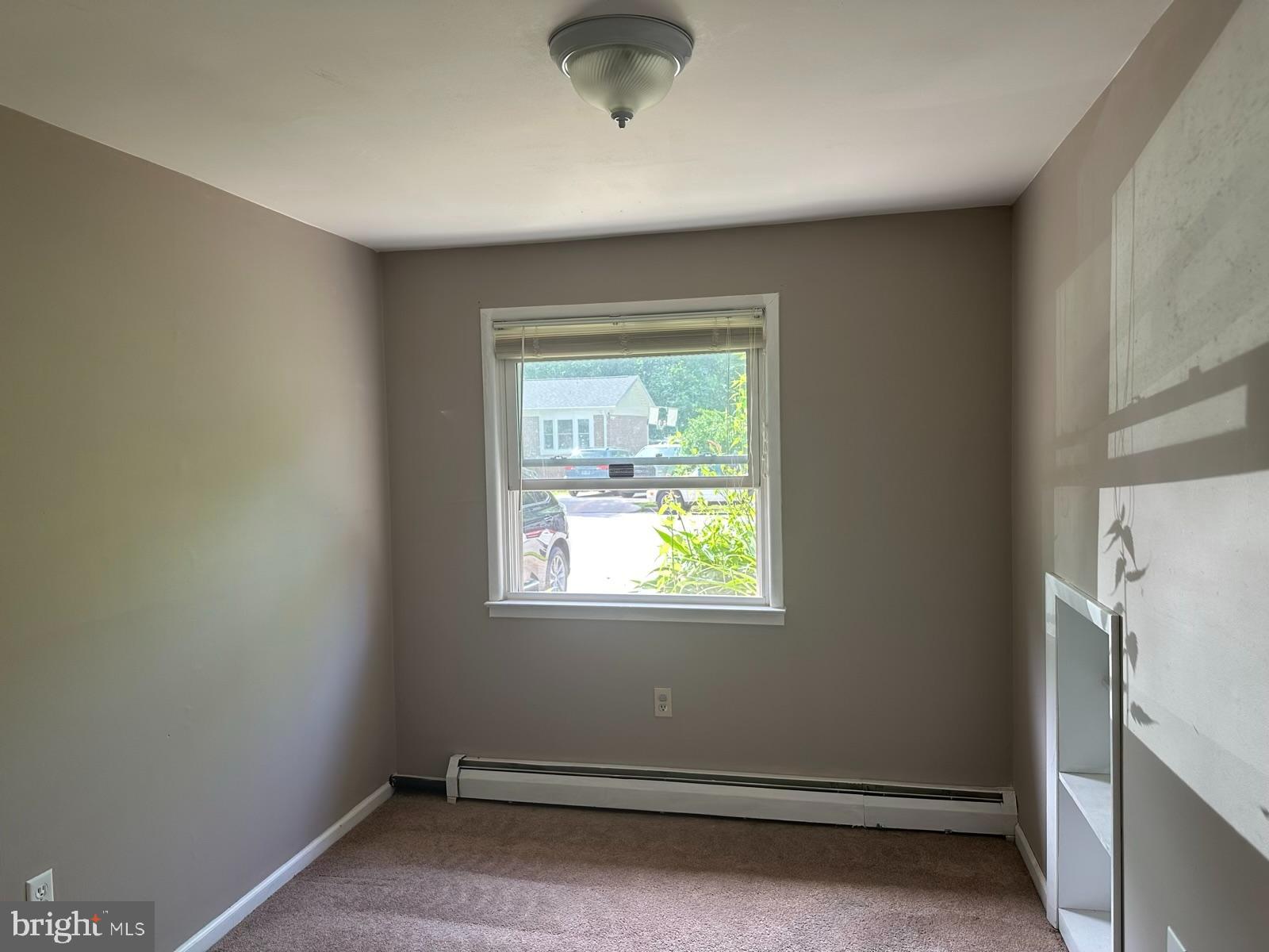 13705 Kerrydale Road Woodbridge, VA 22193 - Photo 22 of 32 an empty room with a window