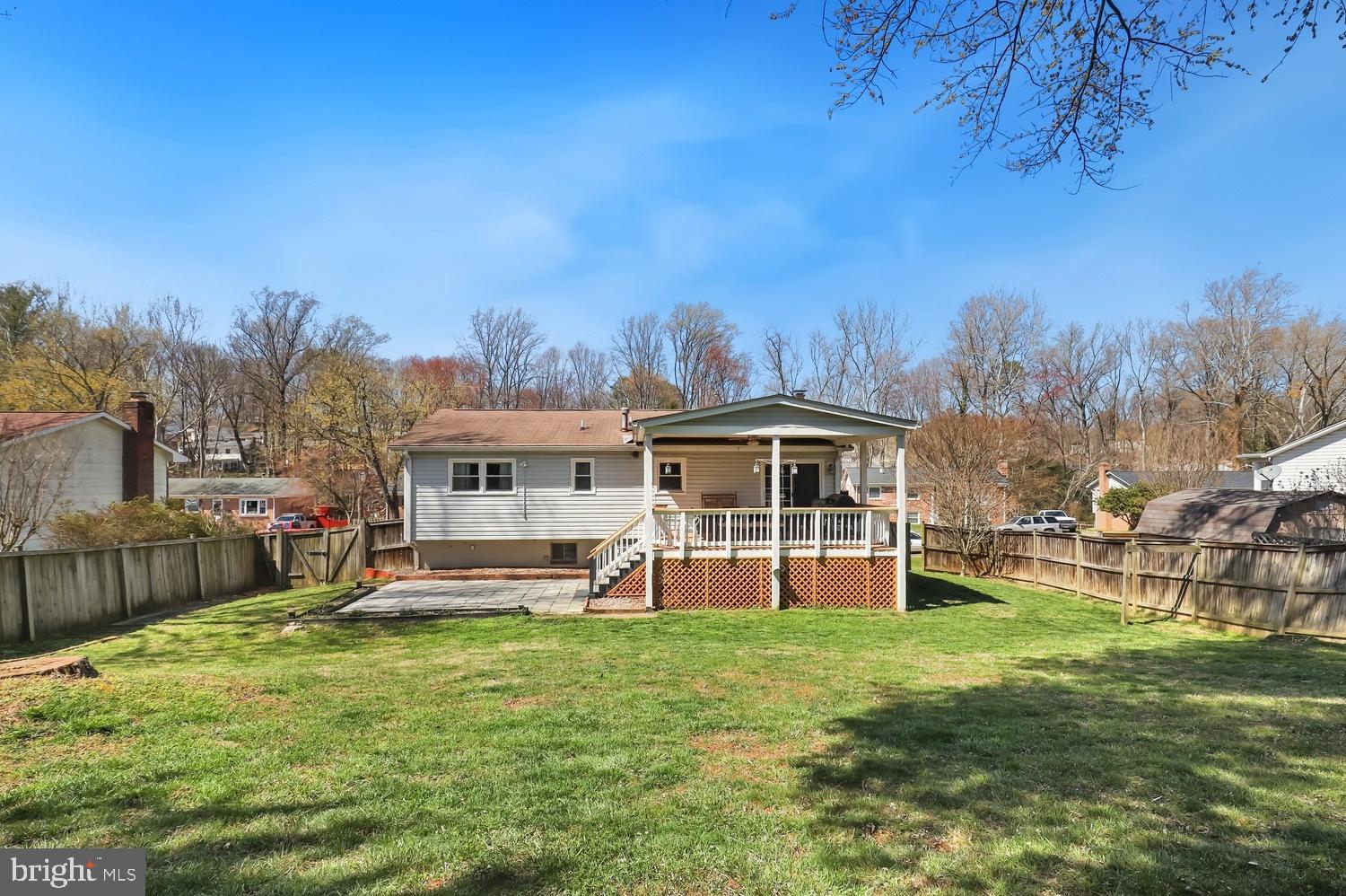 13705 Kerrydale Road Woodbridge, VA 22193 - Photo 28 of 32 a view of a house with a big yard