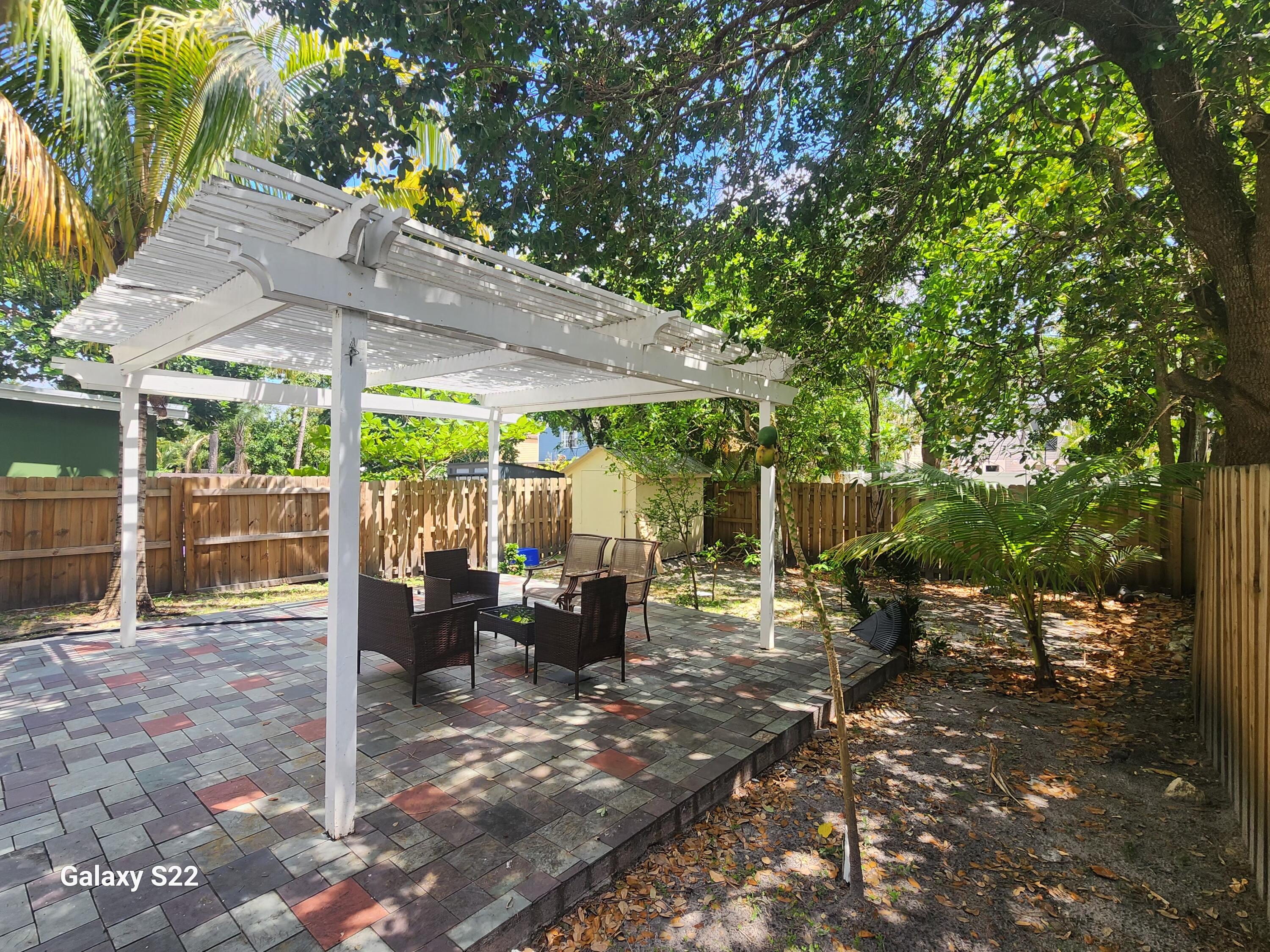 5884 Dewberry Way West Palm Beach, FL 33415 - Photo 3 of 26 a view of outdoor space yard and patio