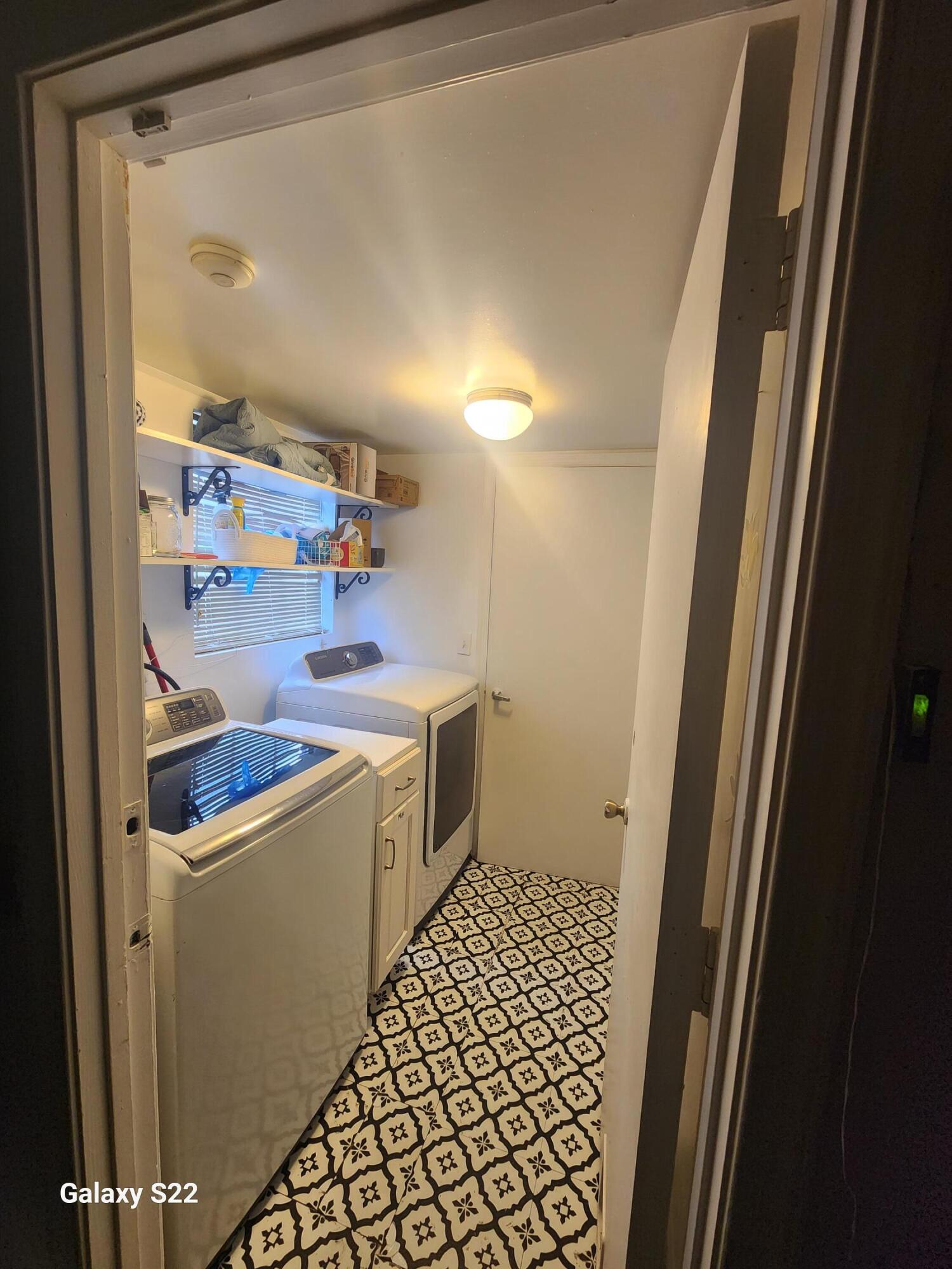 5884 Dewberry Way West Palm Beach, FL 33415 - Photo 5 of 26 a room with storage and utility