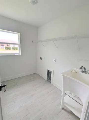 a room with a table and chairs