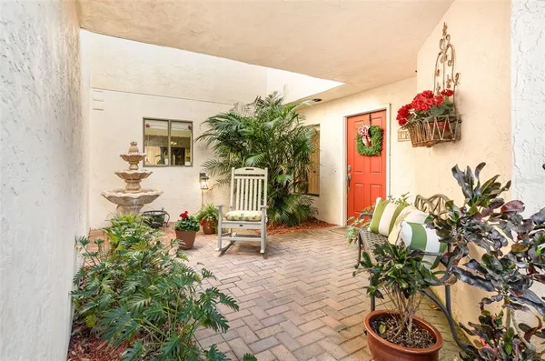 a front view of a house with patio