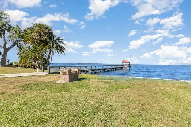 a view of a swimming pool and an outdoor space