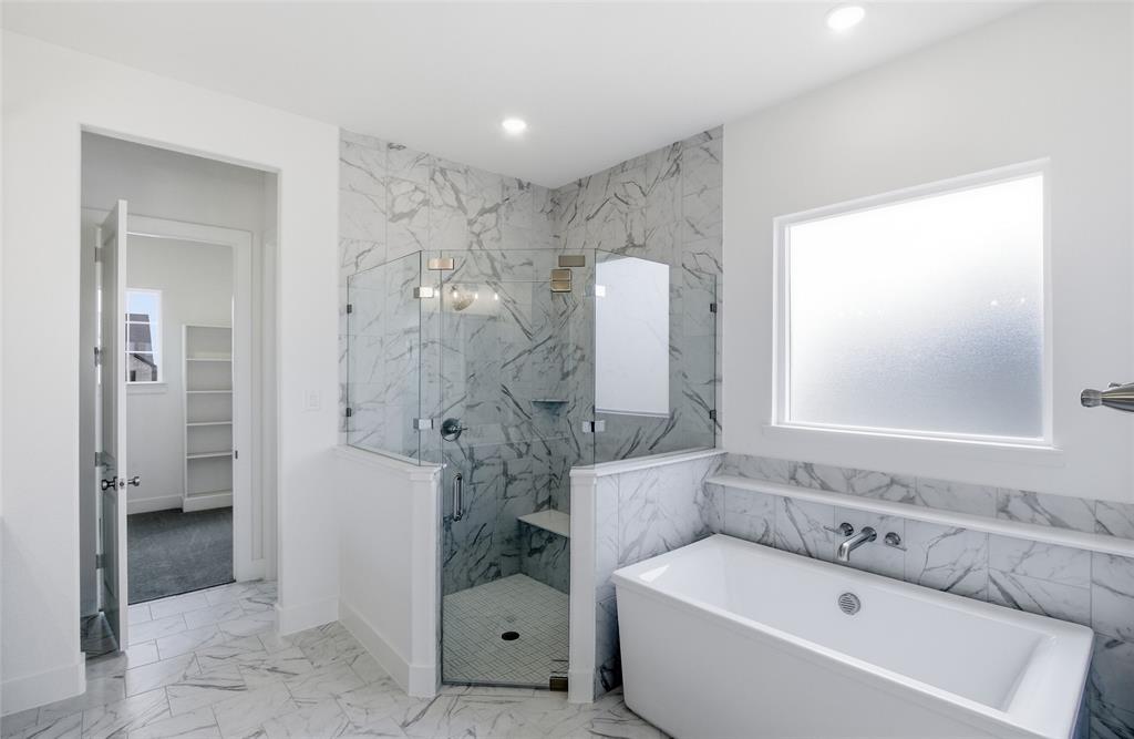 808 Vly Rdg Road Van Alstyne, TX 75495 - Photo 25 of 39 a bathroom with a bathtub and a shower