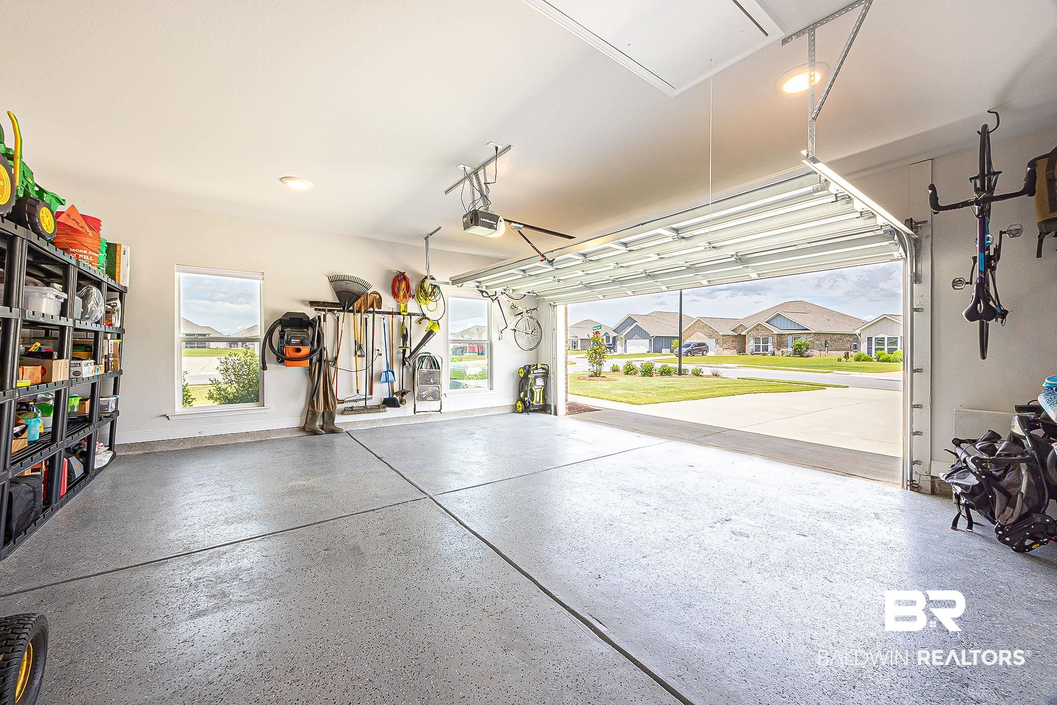 11044 Native Dancer Way Daphne, AL 36526 - Photo 36 of 67 Garage with a garage door opener