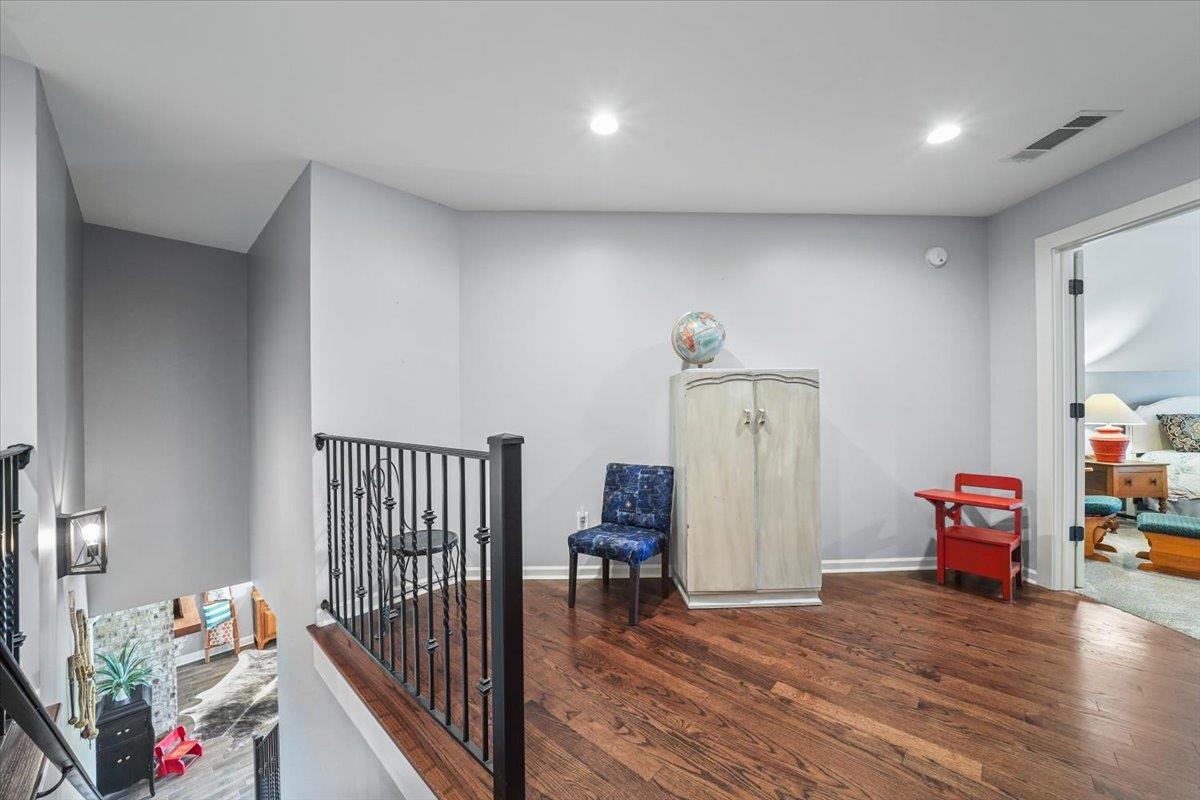 4374 Gainsville Road Mason, TN 38049 - Photo 24 of 40 Hallway featuring dark wood finished floors, an upstairs landing, and recessed lighting