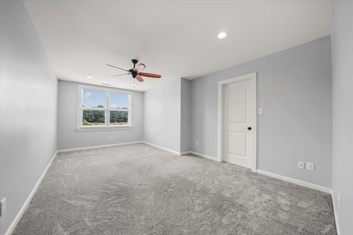 4374 Gainsville Road Mason, TN 38049 - Photo 26 of 40 Empty room featuring carpet floors, recessed lighting, and ceiling fan