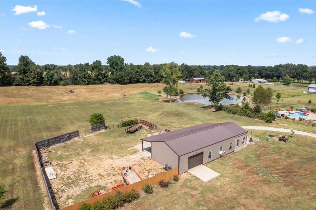 4374 Gainsville Road Mason, TN 38049 - Photo 27 of 40 View of rural area featuring a tree filled landscape and a nearby body of water