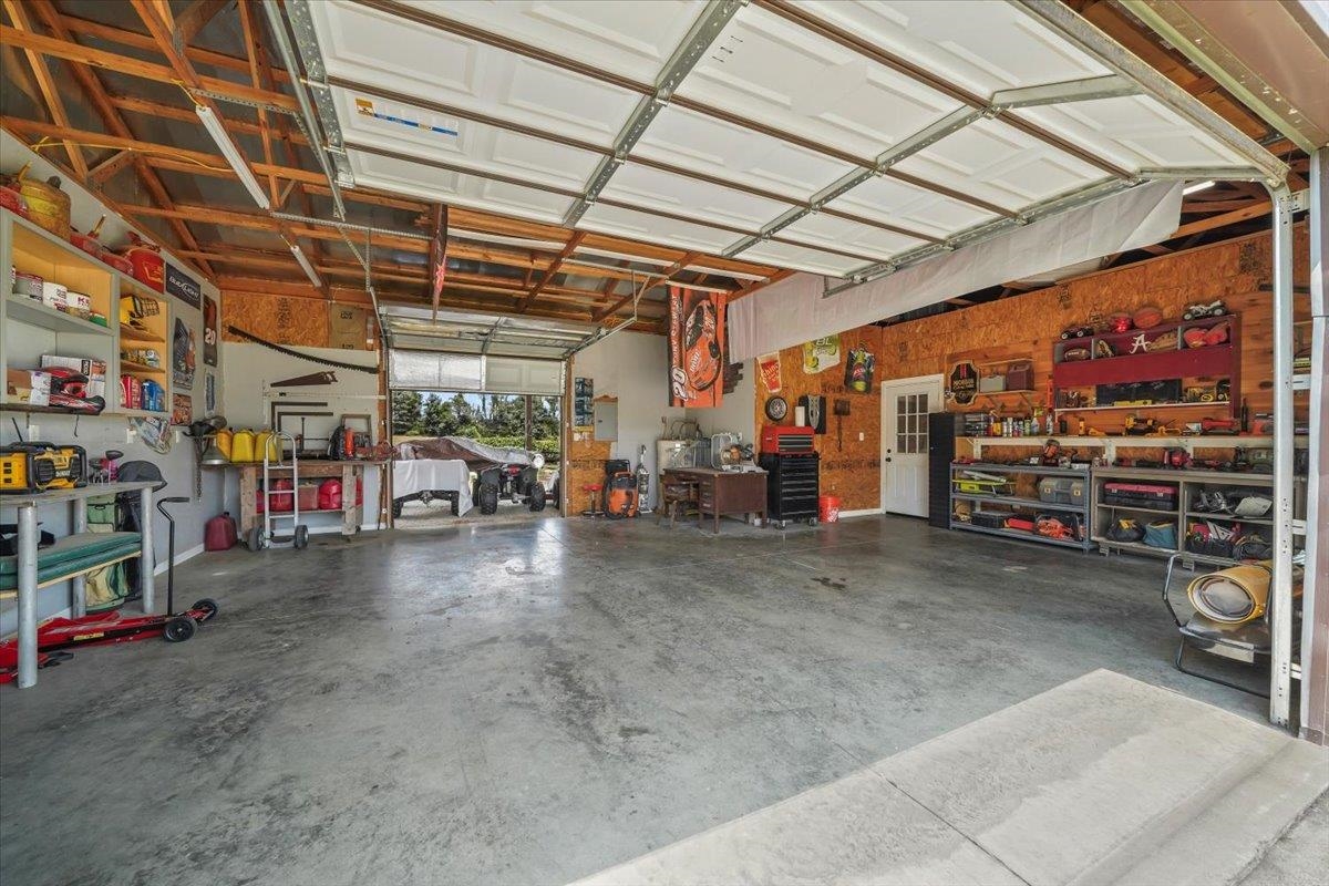 4374 Gainsville Road Mason, TN 38049 - Photo 32 of 40 Garage featuring a workshop area