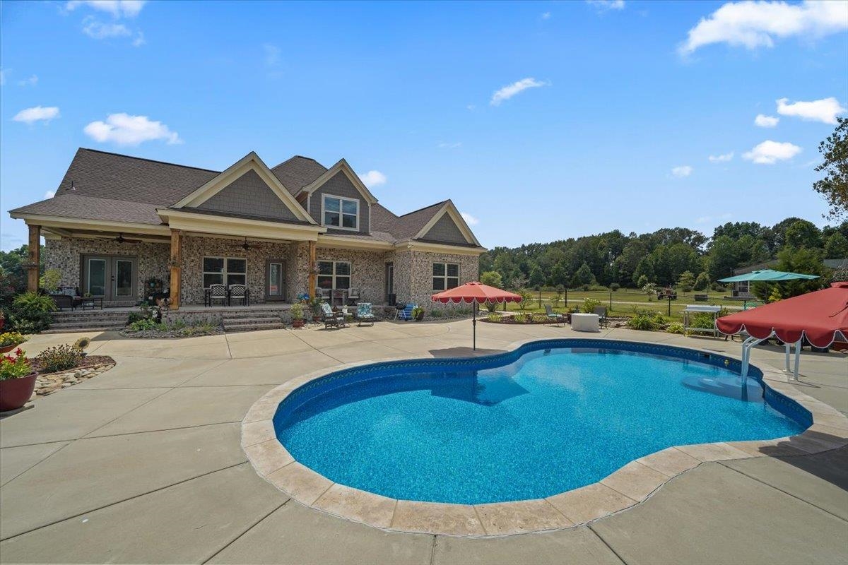 4374 Gainsville Road Mason, TN 38049 - Photo 35 of 40 Swimming pool with a patio area