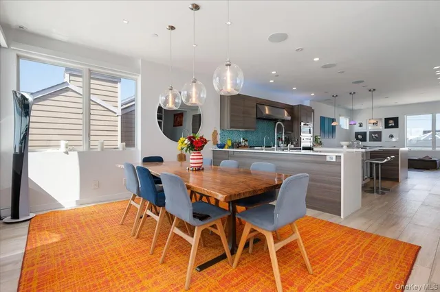a kitchen with stainless steel appliances lots of counter top space and cabinets
