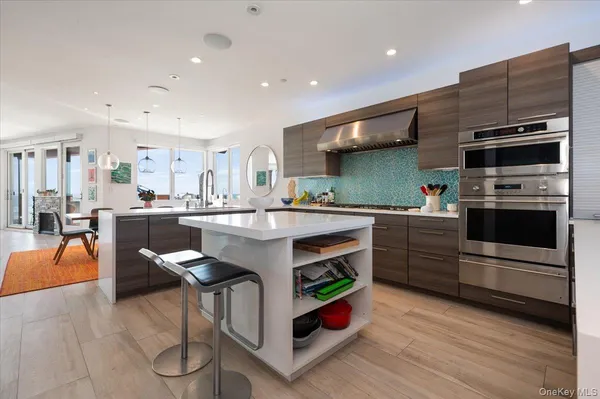 a kitchen with wooden cabinets and white appliances