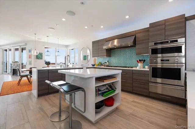 a kitchen with wooden cabinets and white appliances