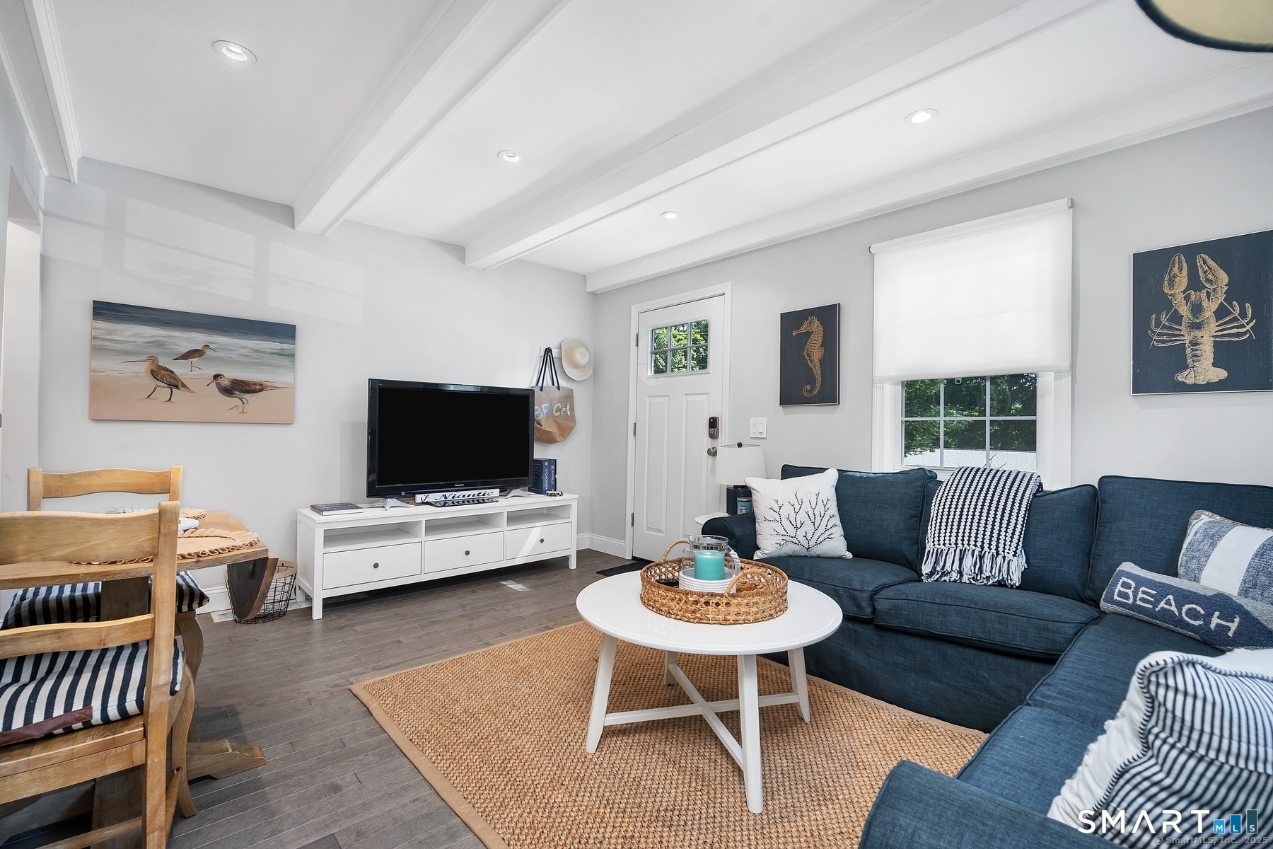 76 South Edgewood Road East Lyme, CT 06357 - Photo 15 of 18 a living room with furniture and a flat screen tv