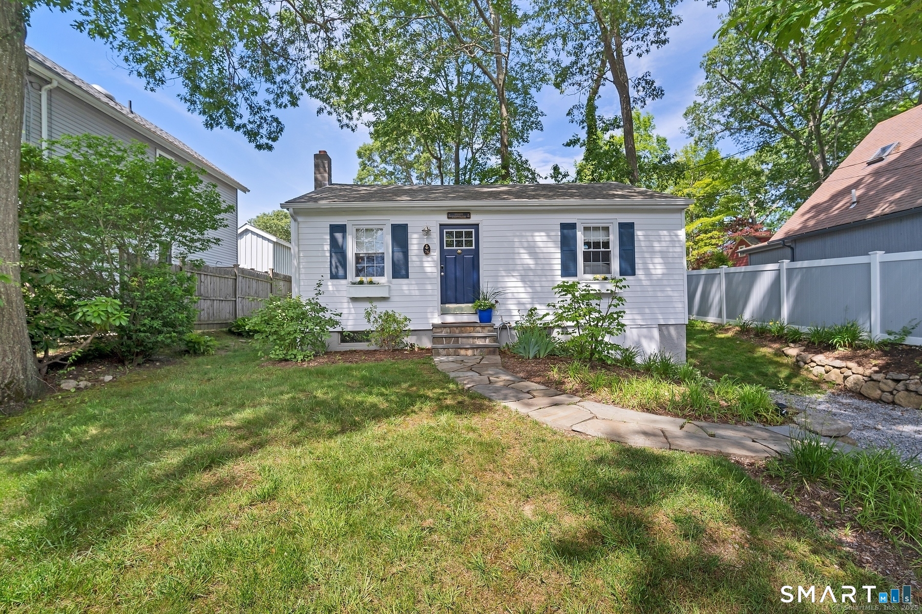 76 South Edgewood Road East Lyme, CT 06357 - Photo 2 of 18 front view of a house with a yard