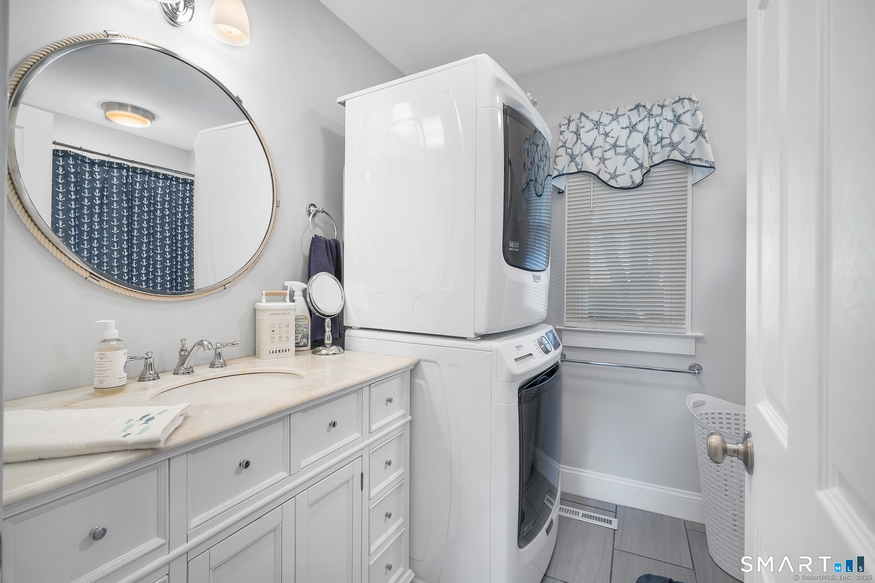 76 South Edgewood Road East Lyme, CT 06357 - Photo 10 of 18 a bathroom with a sink and mirror