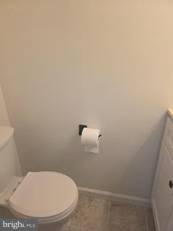 a bathroom with a toilet
