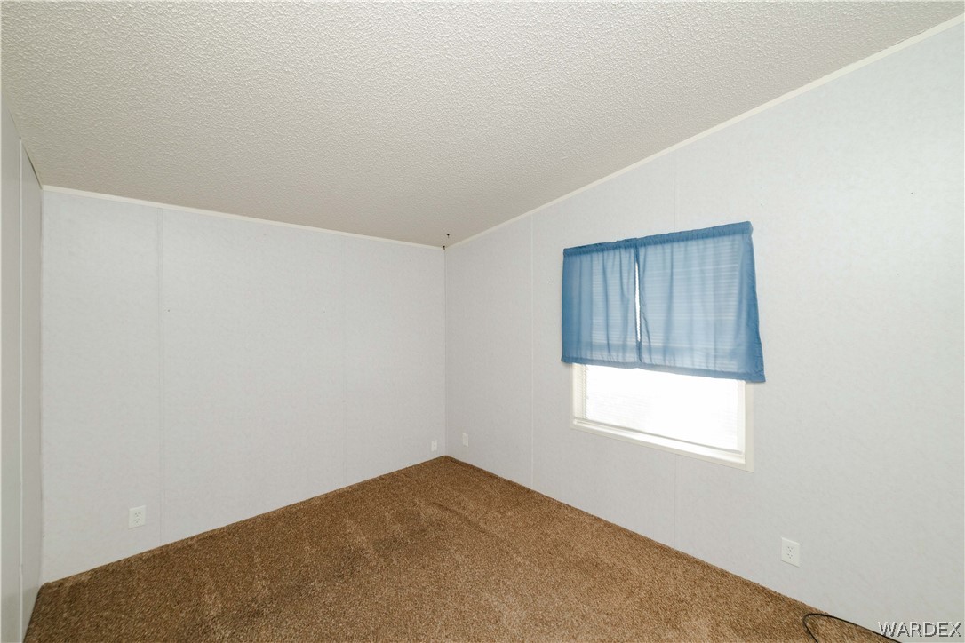 3003 Hualapai Mountain Road Kingman, AZ 86401 - Photo 27 of 49 an empty room with windows