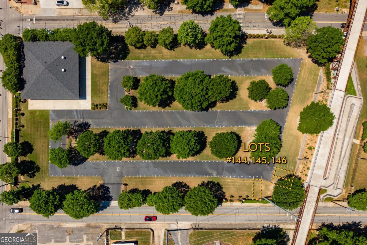 an aerial view of a house with a garden