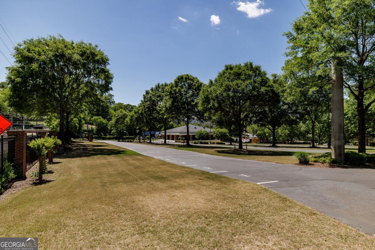 225 Oak Street, Unit 144 Athens, GA 30601 - Photo 17 of 23 a view of a swimming pool and trees