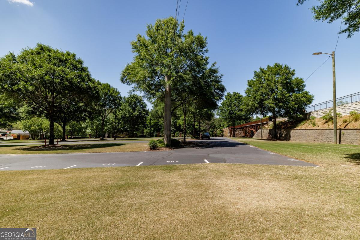 225 Oak Street, Unit 144 Athens, GA 30601 - Photo 18 of 23 a view of a yard with a house