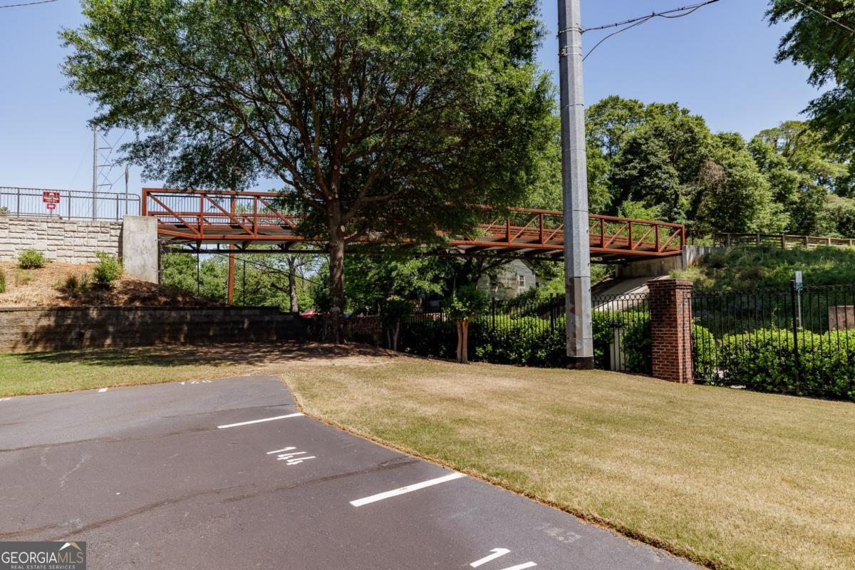 225 Oak Street, Unit 144 Athens, GA 30601 - Photo 19 of 23 a view of a house with a yard and potted plants