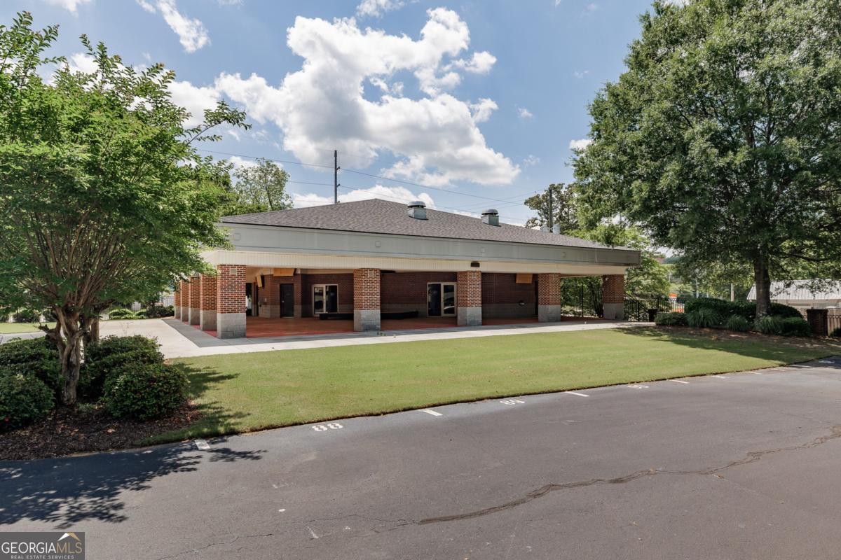 225 Oak Street, Unit 144 Athens, GA 30601 - Photo 23 of 23 a front view of a house with a garden