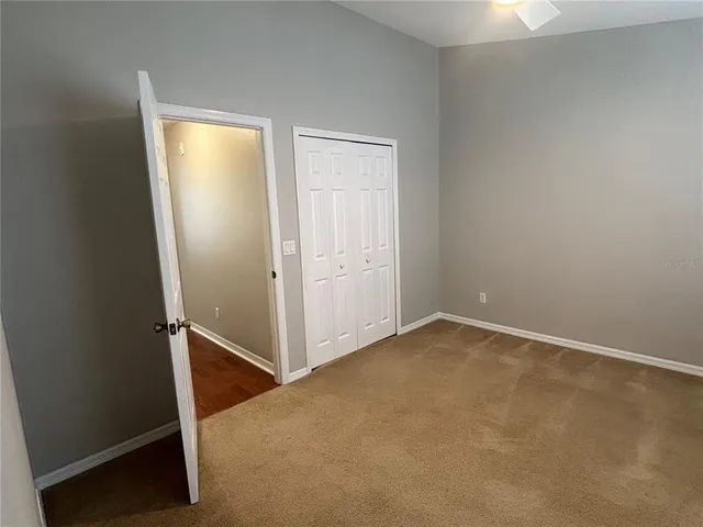 a view of a backyard of the house