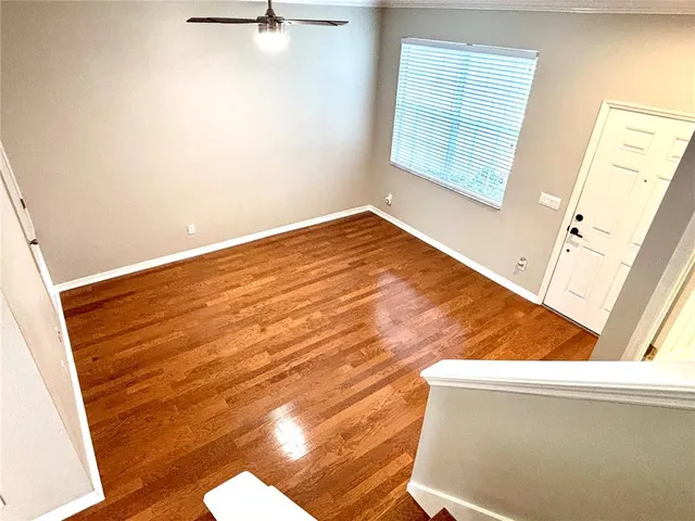 a view of an empty room with a window