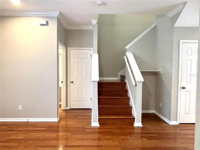 a view of entryway with wooden floor