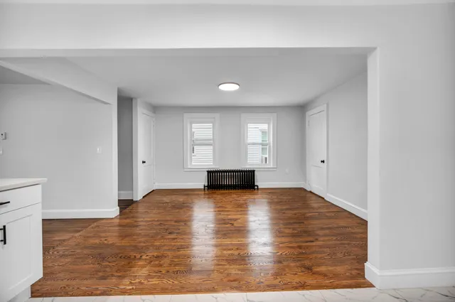 a view of empty room with a window