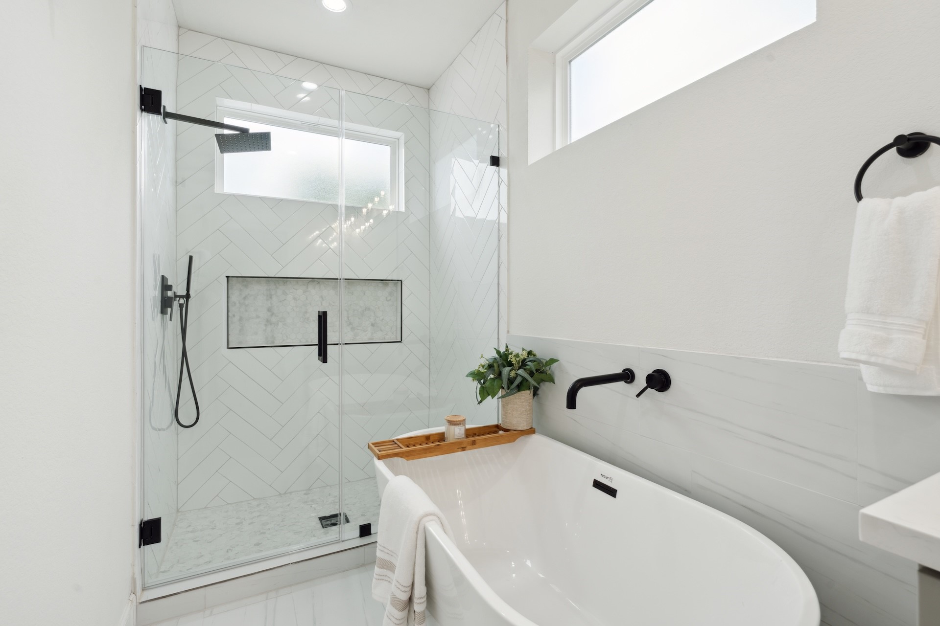 6408 Foster Street Houston, TX 77021 - Photo 28 of 39 Custom primary shower sanctuary — frameless glass enclosure, rain showerhead with handheld sprayer, wall-mounted matte black tub filler, and freestanding soaking tub.