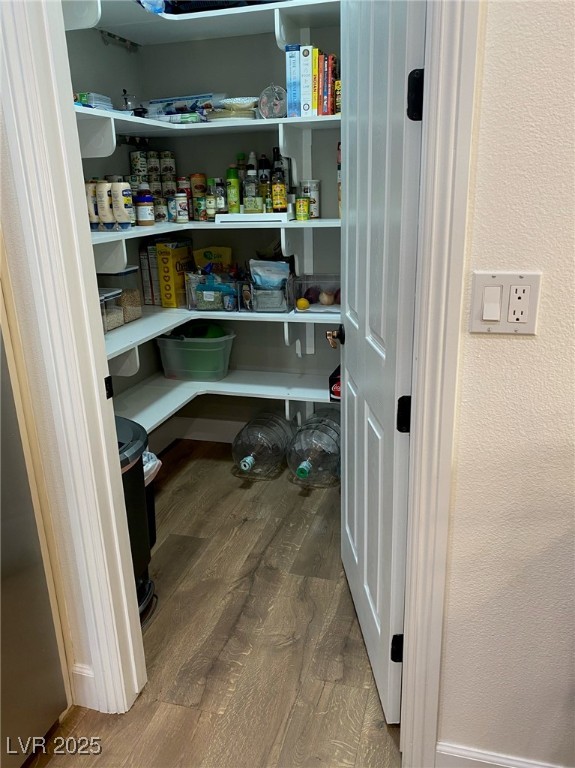 11280 Granite Ridge Drive, Unit 1037 Las Vegas, NV 89135 - Photo 60 of 62 Kitchen Pantry, next to built-in refrigerator