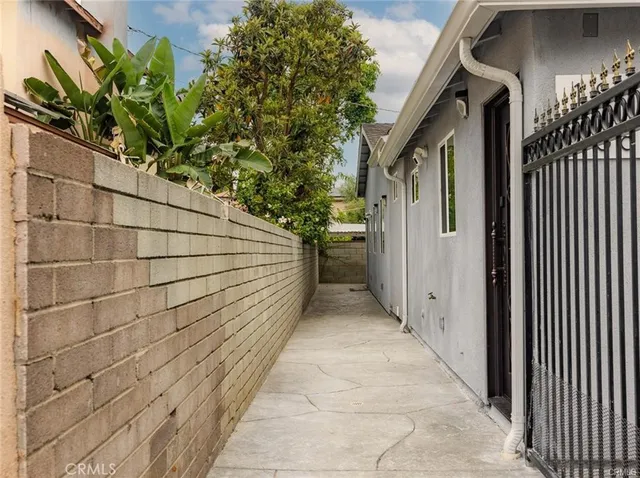 a view of front door and deck of the house