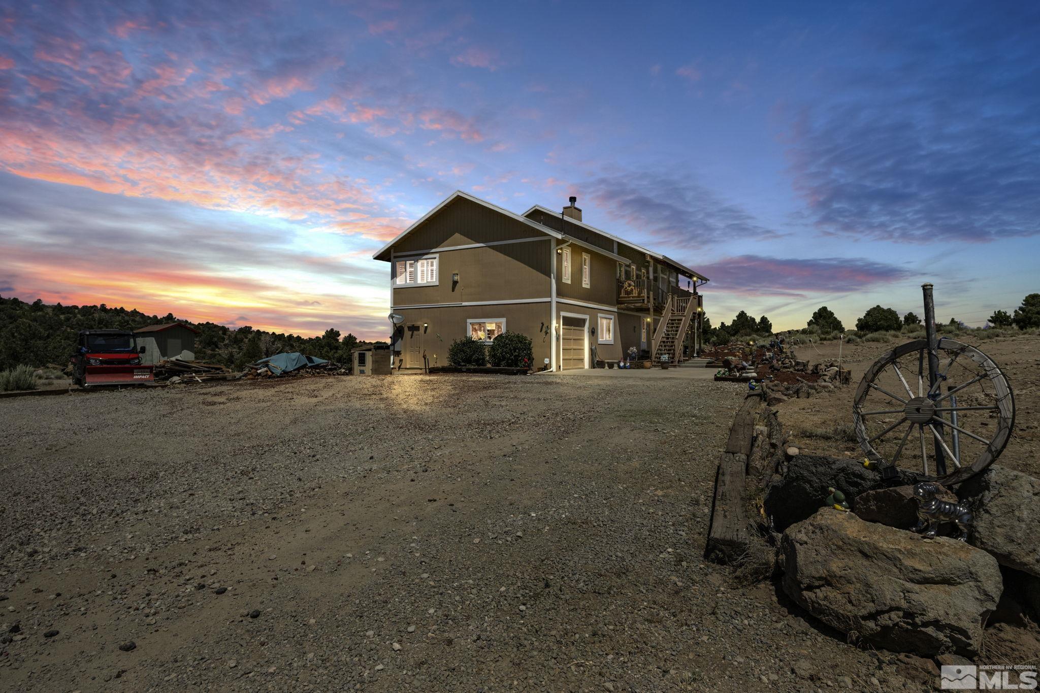 1970 Scorpion Road Reno, NV 89521 - Photo 2 of 40 a view of a house with a big yard