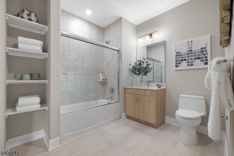 169 Johnson Road Morris Plains, NJ 07950 - Photo 13 of 13 a bathroom with a bathtub toilet and sink