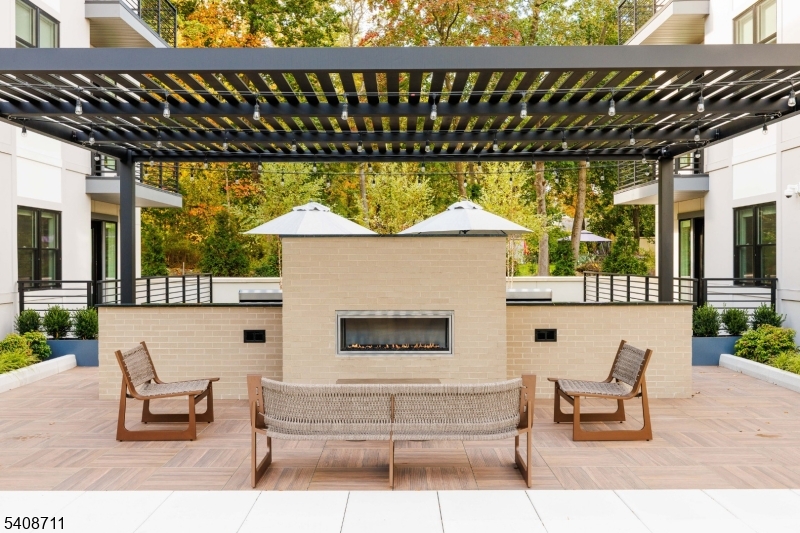 169 Johnson Road Morris Plains, NJ 07950 - Photo 10 of 13 a building outdoor space with patio furniture and potted plants