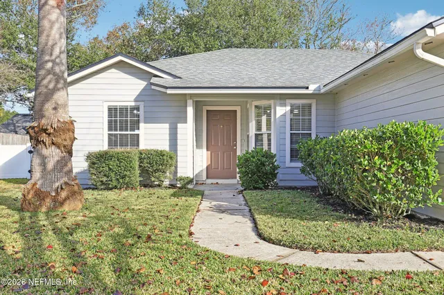 a view of a house with garden