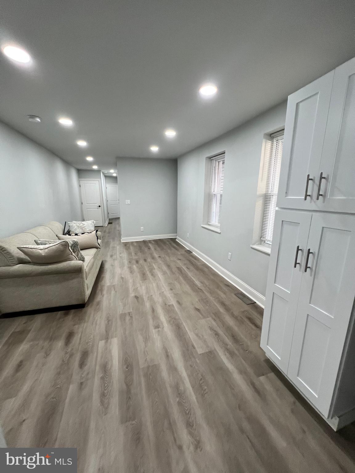 1705 South 18th Street, Unit 1 Philadelphia, PA 19145 - Photo 6 of 18 a view of a room with wooden floor