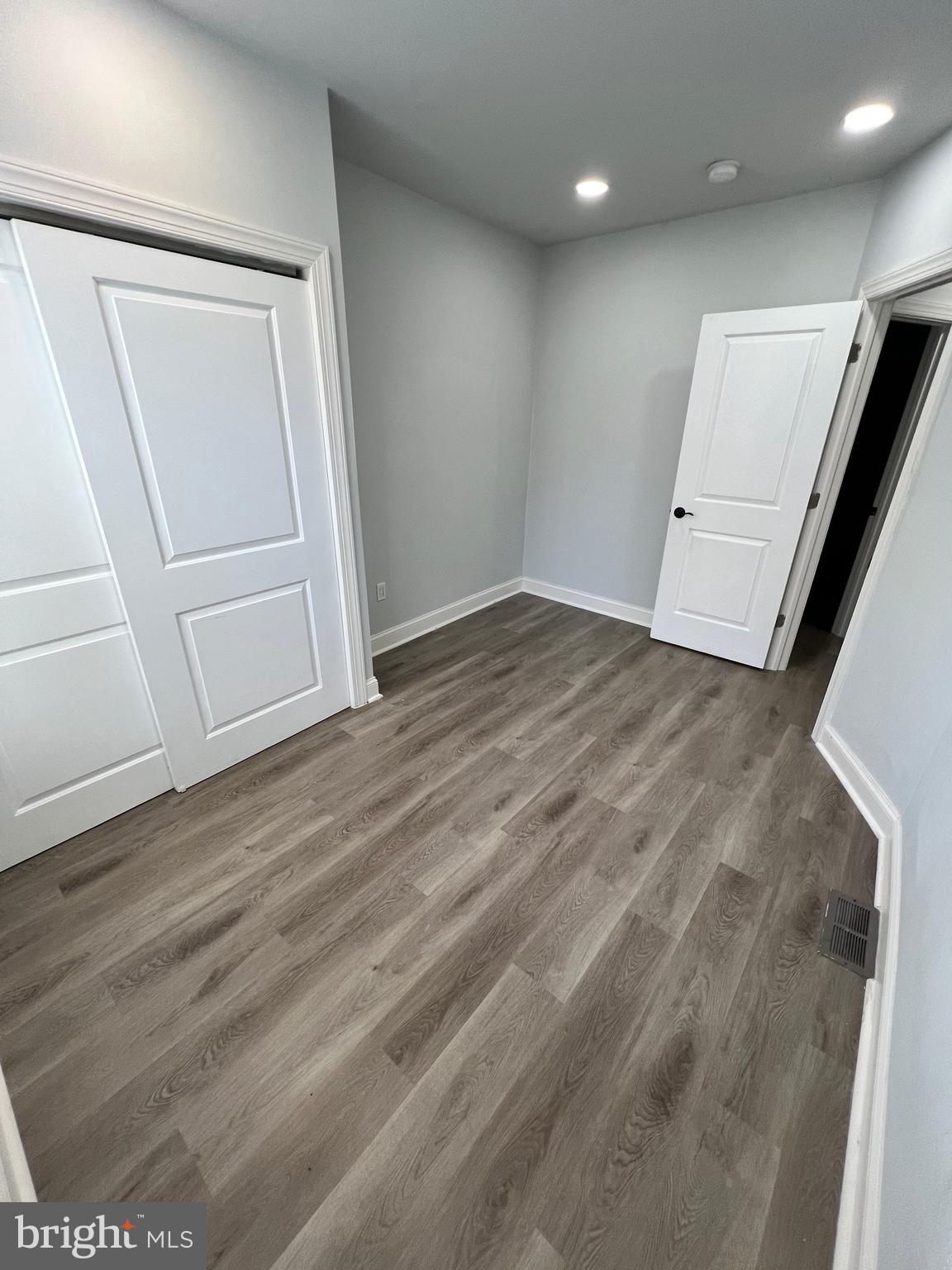 1705 South 18th Street, Unit 1 Philadelphia, PA 19145 - Photo 8 of 18 a view of empty room with wooden floor