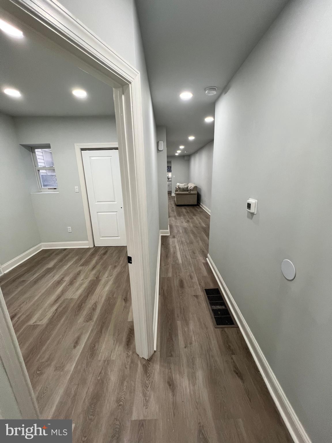 1705 South 18th Street, Unit 1 Philadelphia, PA 19145 - Photo 9 of 18 a view of hallway with wooden floor