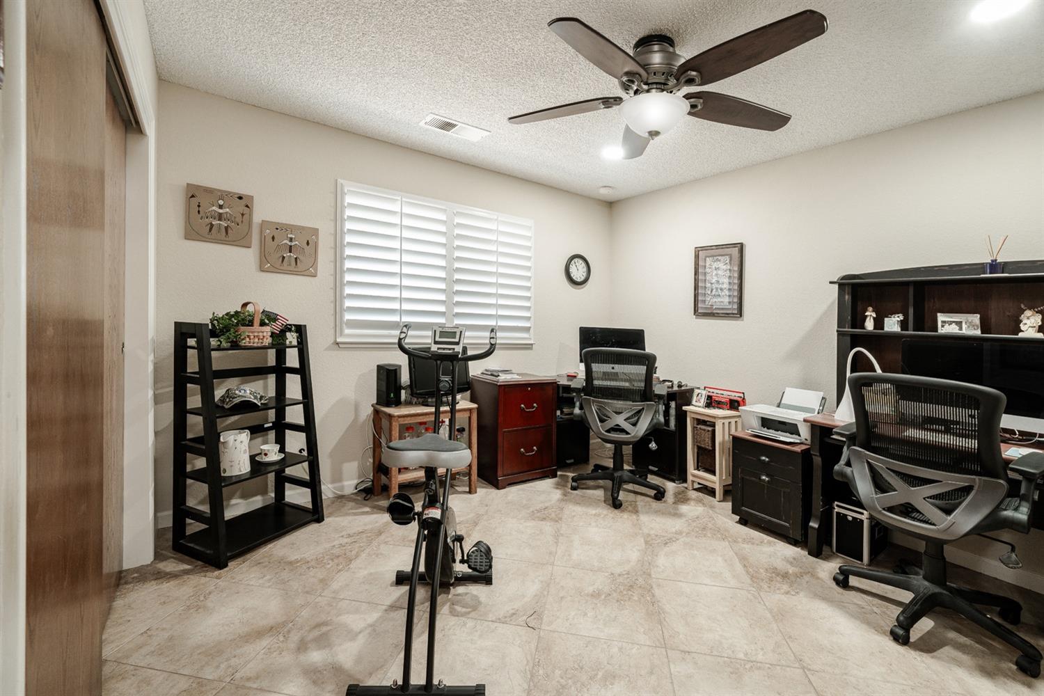 1021 Pistachio Avenue Clovis, CA 93611 - Photo 13 of 27 a view of a workspace with furniture