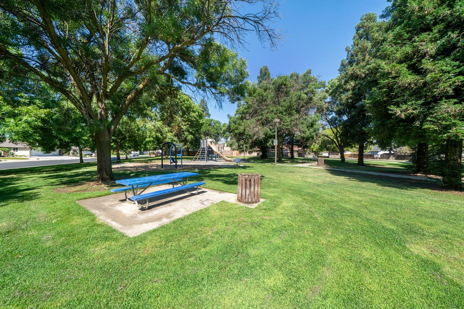 1021 Pistachio Avenue Clovis, CA 93611 - Photo 26 of 27 a park view with a bench