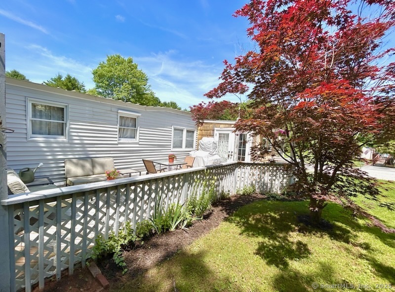 51 James Drive Windham, CT 06256 - Photo 1 of 1 a front view of a house with a yard