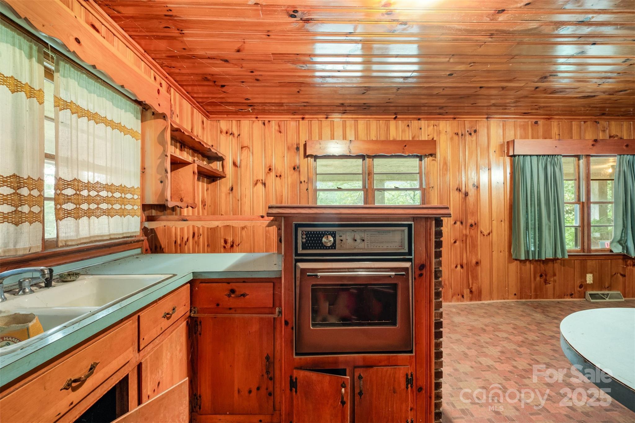 2412 Daves Road Shelby, NC 28150 - Photo 13 of 38 a kitchen with a stove and a sink