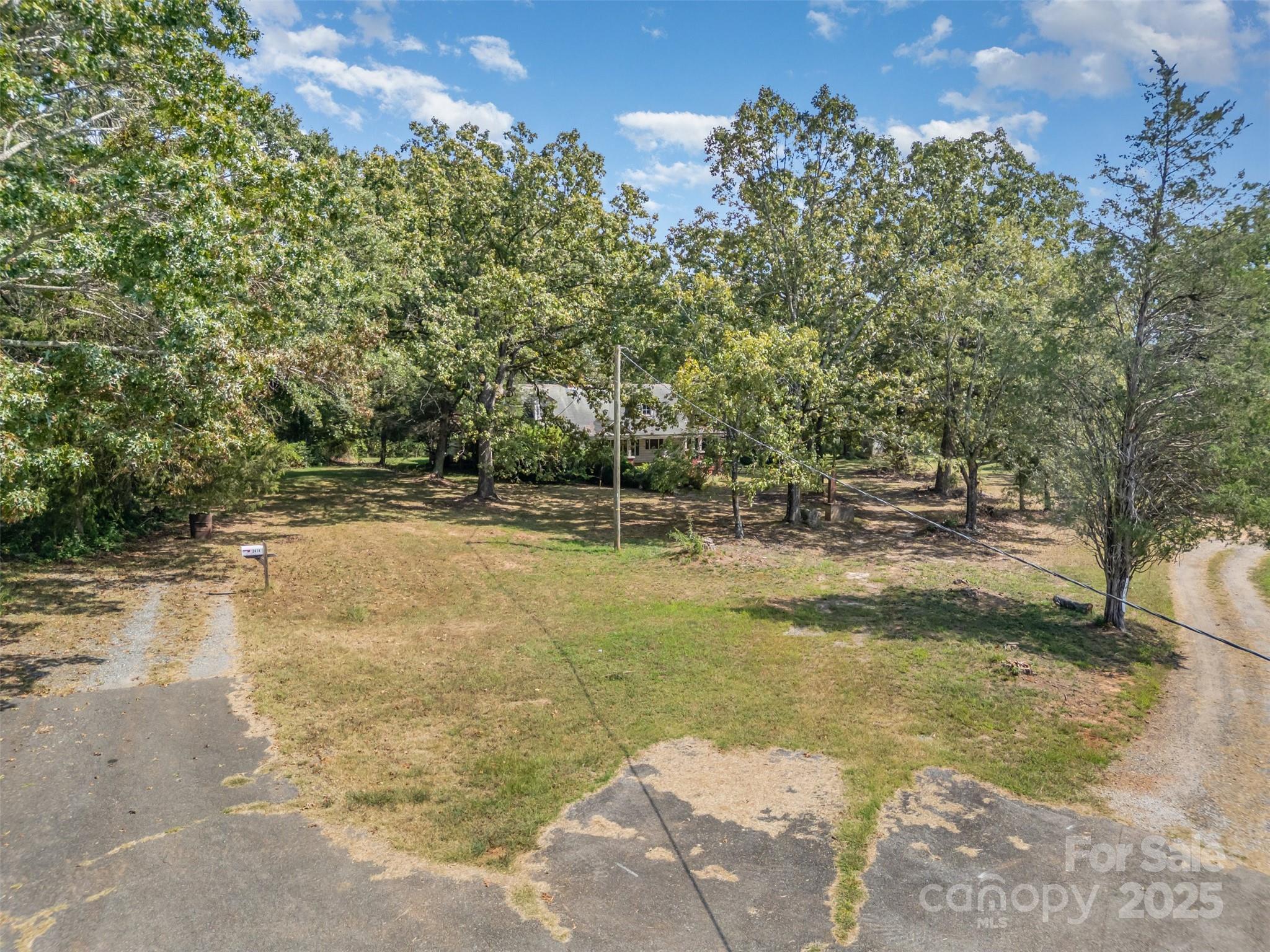 2412 Daves Road Shelby, NC 28150 - Photo 35 of 38 a view of a yard with trees