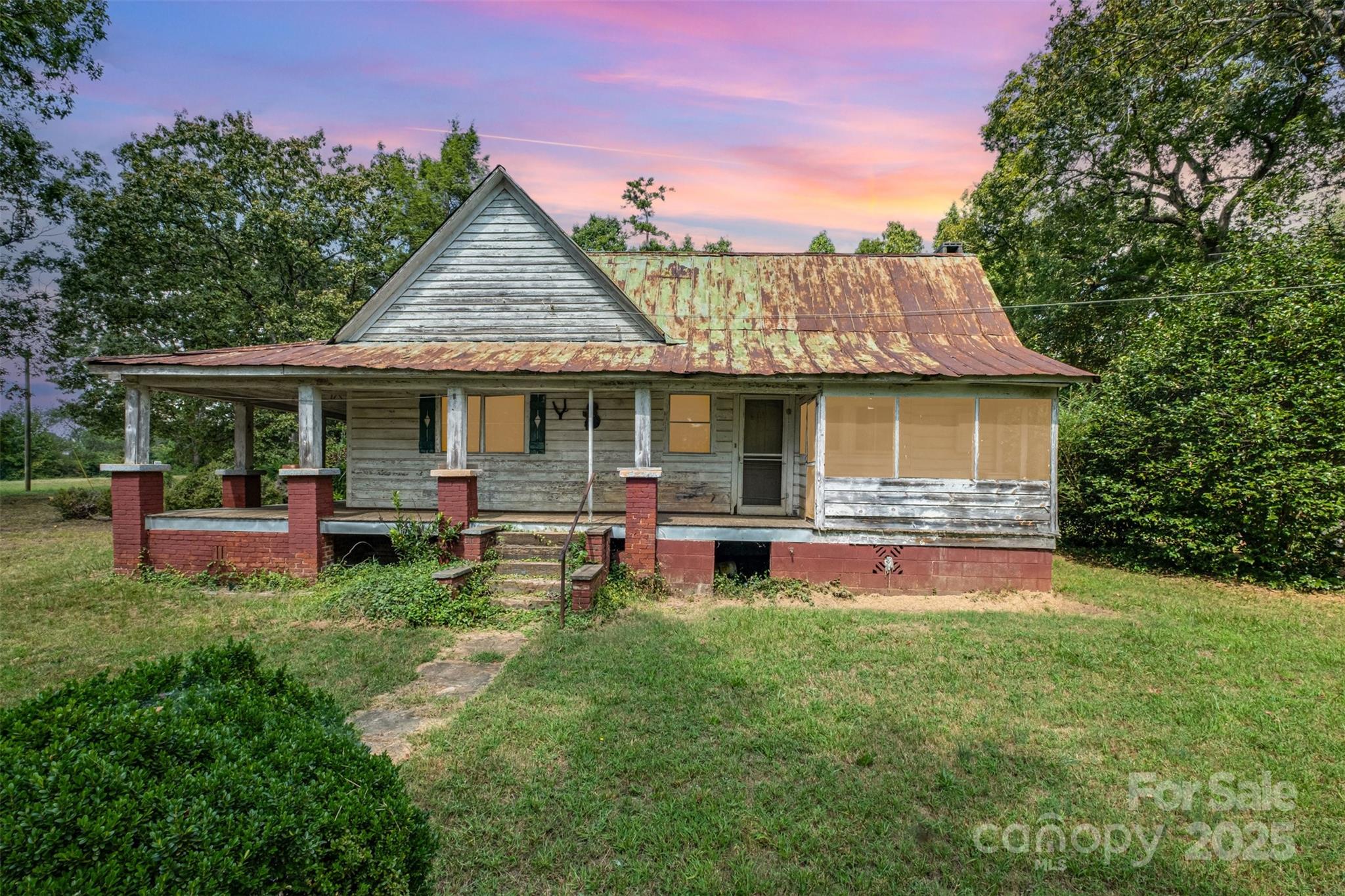2412 Daves Road Shelby, NC 28150 - Photo 37 of 38 a view of a house with a backyard patio and swimming pool
