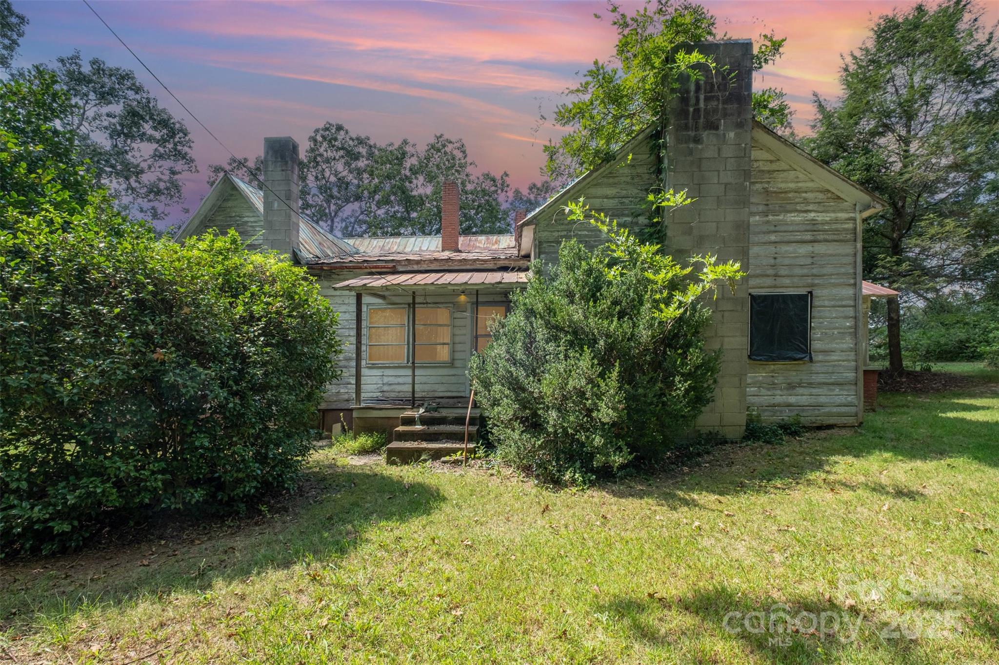2412 Daves Road Shelby, NC 28150 - Photo 38 of 38 a backyard of a house with lots of green space