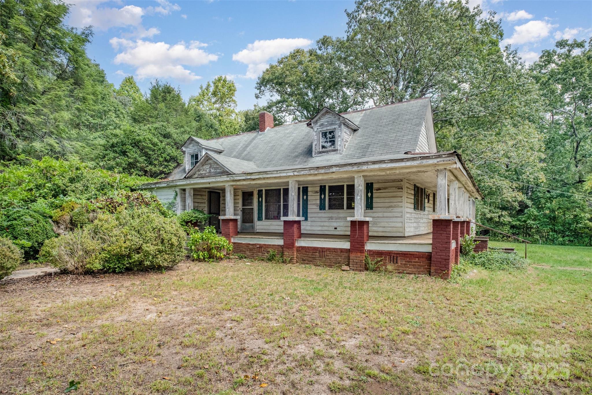 2412 Daves Road Shelby, NC 28150 - Photo 4 of 38 a view of a house with a yard porch and sitting area